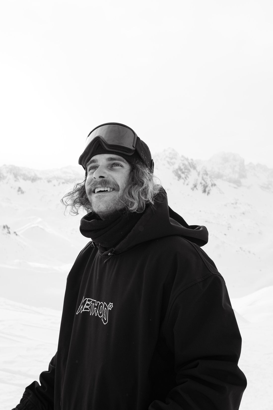 Gregory Waite on a snowy mountain, smiling